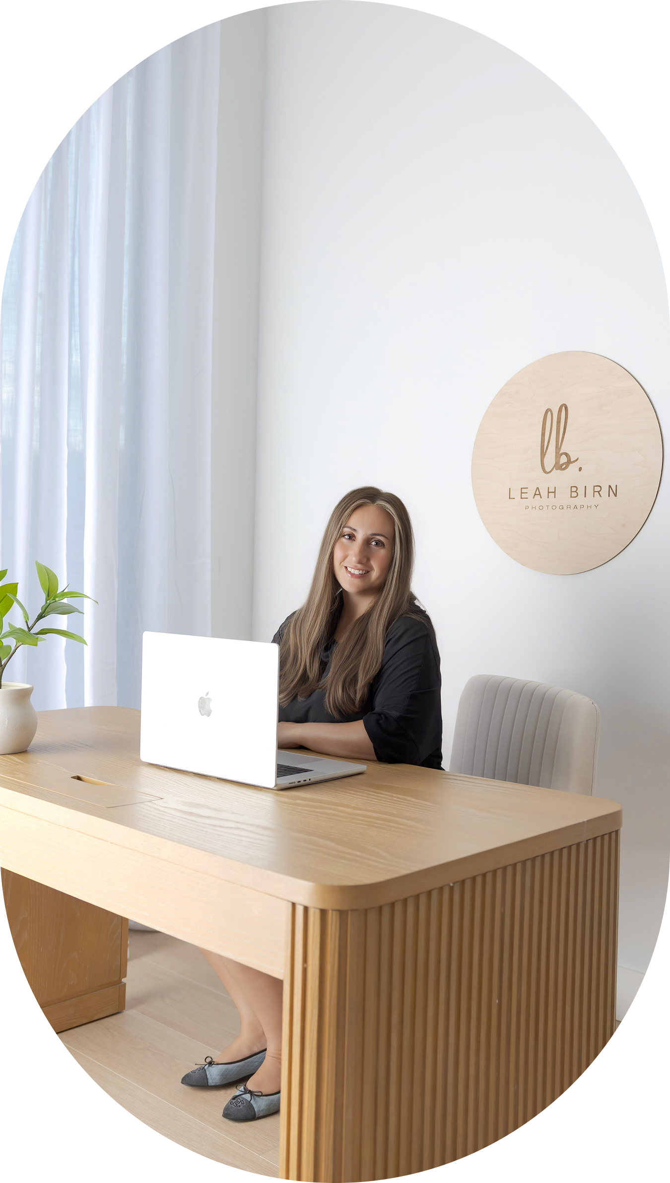 Leah Birn at her photography studio desk